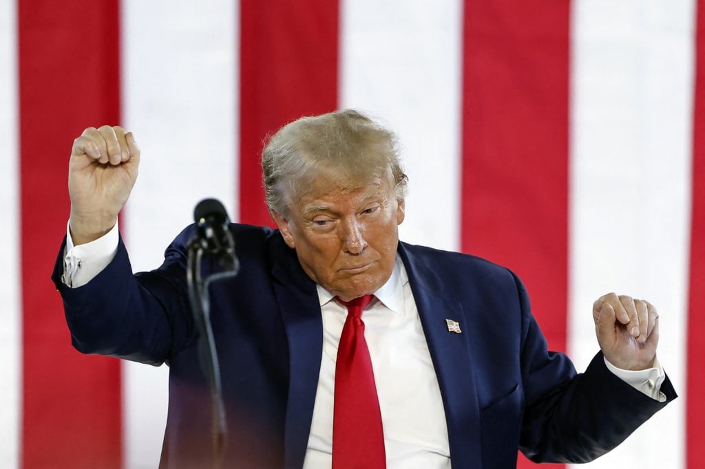 Former US President and 2024 Presidential hopeful Donald Trump speaks during a Team Trump Iowa Commit to Caucus event at the National Cattle Congress in Waterloo, Iowa, on October 7, 2023. (Photo by KAMIL KRZACZYNSKI / AFP)