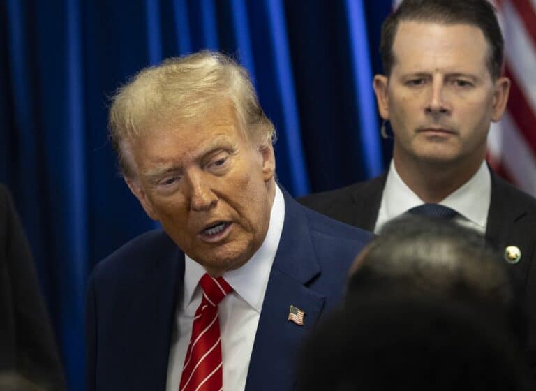 Former US President and 2024 presidential hopeful Donald Trump greets his supporters at a Commit to Caucus rally in Newton, Iowa on January 6, 2024. (Photo by Christian MONTERROSA / AFP)