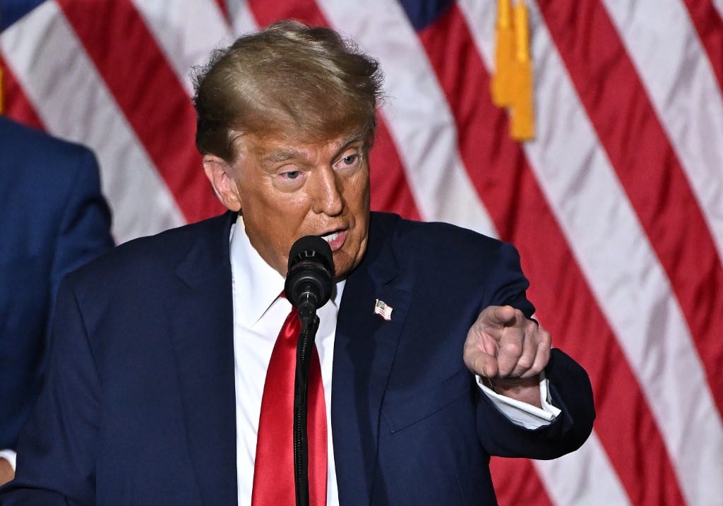 Former US President and Republican presidential hopeful Donald Trump speaks at a watch party during the 2024 Iowa Republican presidential caucuses in Des Moines, Iowa, on January 15, 2024. Trump told Americans Monday "it is time for our country to come together" after he won the Iowa caucuses, cementing his status as the likely Republican challenger to take on President Joe Biden in November's election. (Photo by Jim WATSON / AFP)