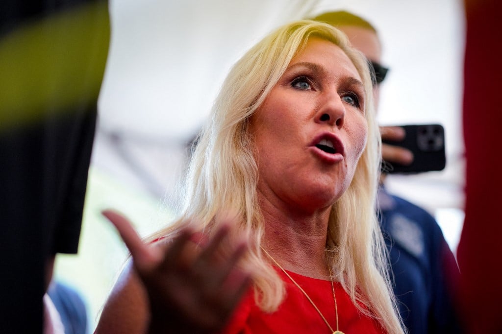 ATLANTA, GEORGIA, UNITED STATES - AUGUST 24: Marjorie Taylor Greene speaks as the arrival of former President Donald Trump outside the Fulton County Jail in Atlanta, Georgia, United States on August 24, 2023. Benjamin Hendren / Anadolu Agency (Photo by Benjamin Hendren / ANADOLU AGENCY / Anadolu via AFP)