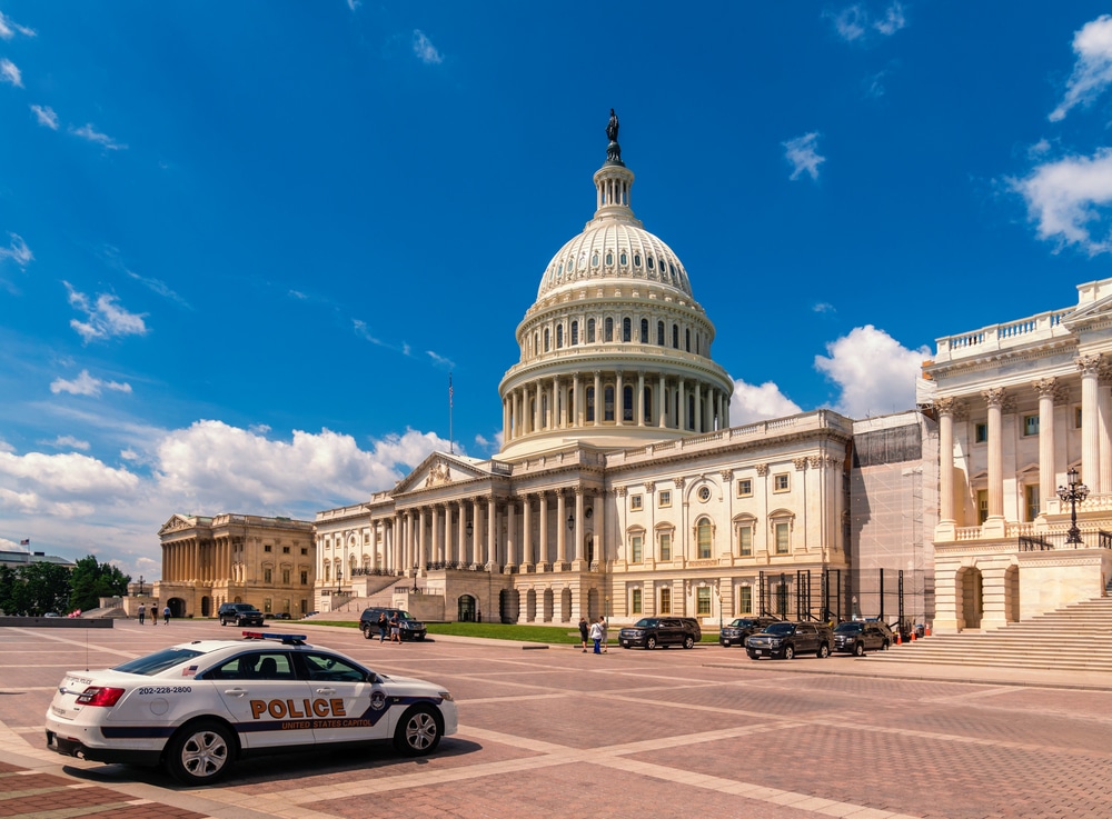 Washington DC - June 6, 2017: United States Capitol Building in Washington DC - East Facade of the famous US landmark with police car in front.